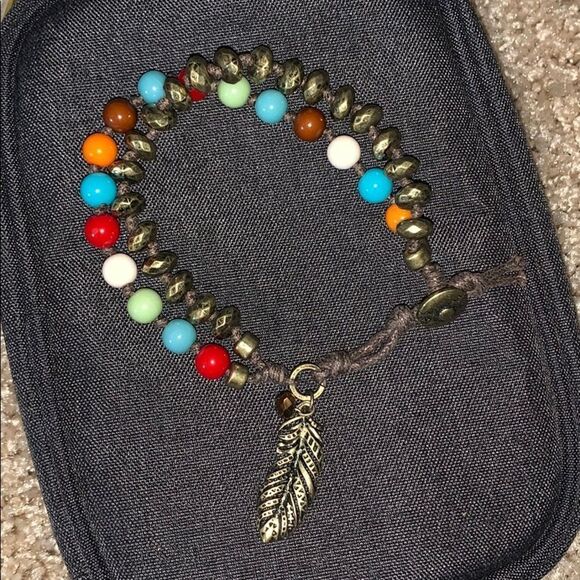 Earthbound colorful beaded feather bracelet. - Picture 1 of 4